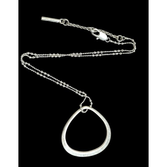 Kenneth Cole Open Teardrop Brushed Silver Tone Pendant Necklace - Picture 1 of 6